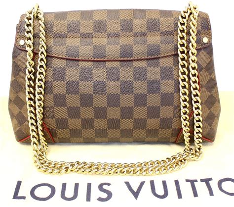 borsa clutch louis vuitton rigida|louis vuitton shoulder clutch.